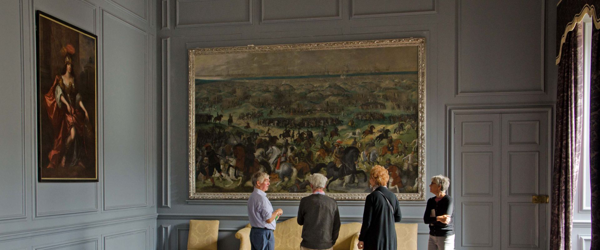 Admiring a painting inside Great Fulford
